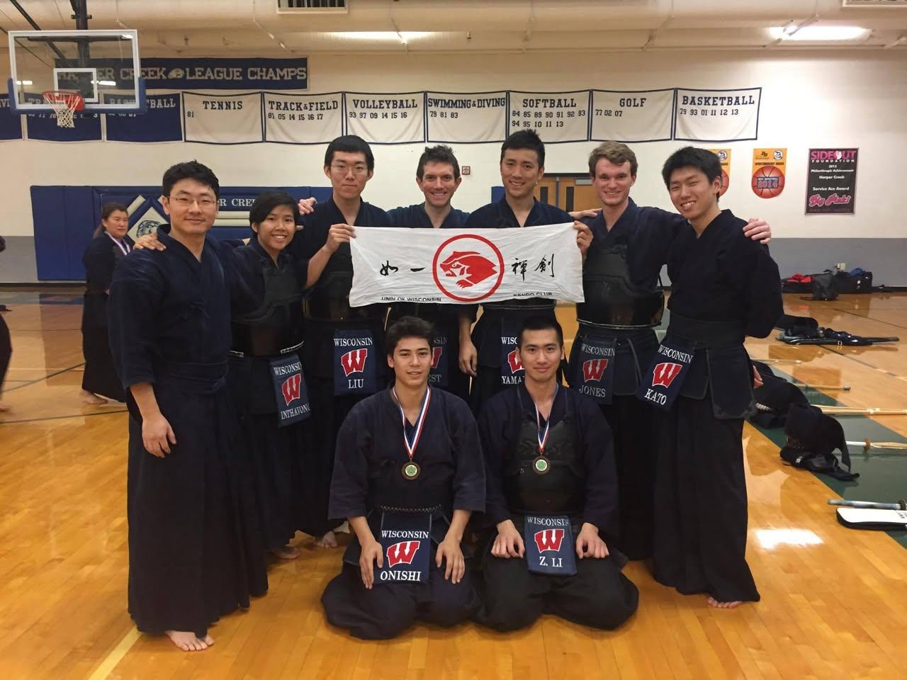 A group of people posing for a photo

AI-generated content may be incorrect.