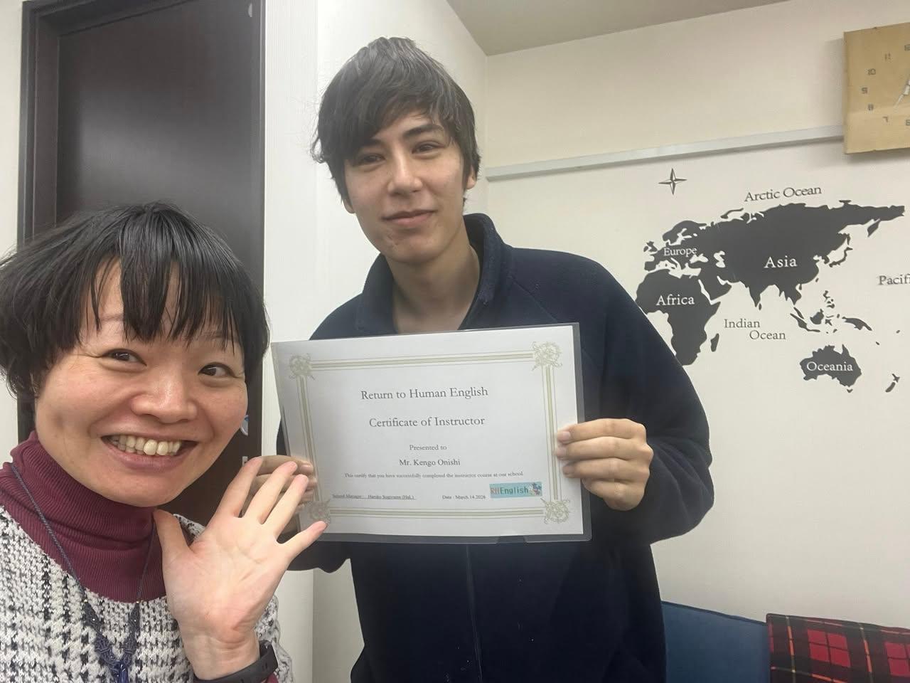 A person and person holding a certificate

AI-generated content may be incorrect.